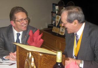 Dion Wainwright has a laugh with President-elect Peter Rhodes