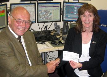 Immediate Past President David Pickover presents our cheque to Nicky de Whytell of Yorkshire Air Ambulance