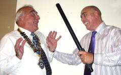 Michael Wharton jokes with President William Smith