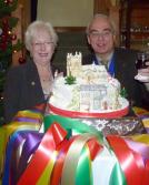 Pauline Gallivan shows off her creation to President William Smith