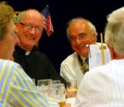 Very Rev George Nairn-Briggs at dinner with President William Smith