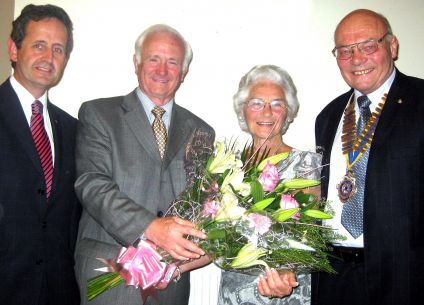 Eileen Fenton is presented with a bouquet by Rtn Ken Pinder watched by Rtn Stuart Livesey and President David Pickover. 11th June 2009