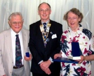 Paul Harris awards presented to Peter & Fran Slater by President Dennis Edwards